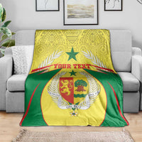 Personalised Senegal blanket coat of arms throw draped over sofa, green and yellow design