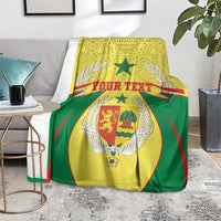 Personalised Senegal blanket coat of arms throw on floor, green and yellow crest artwork