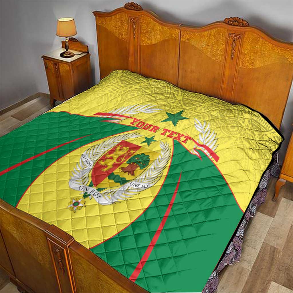 Senegal quilt blanket on bed, yellow and green with coat of arms and custom text
