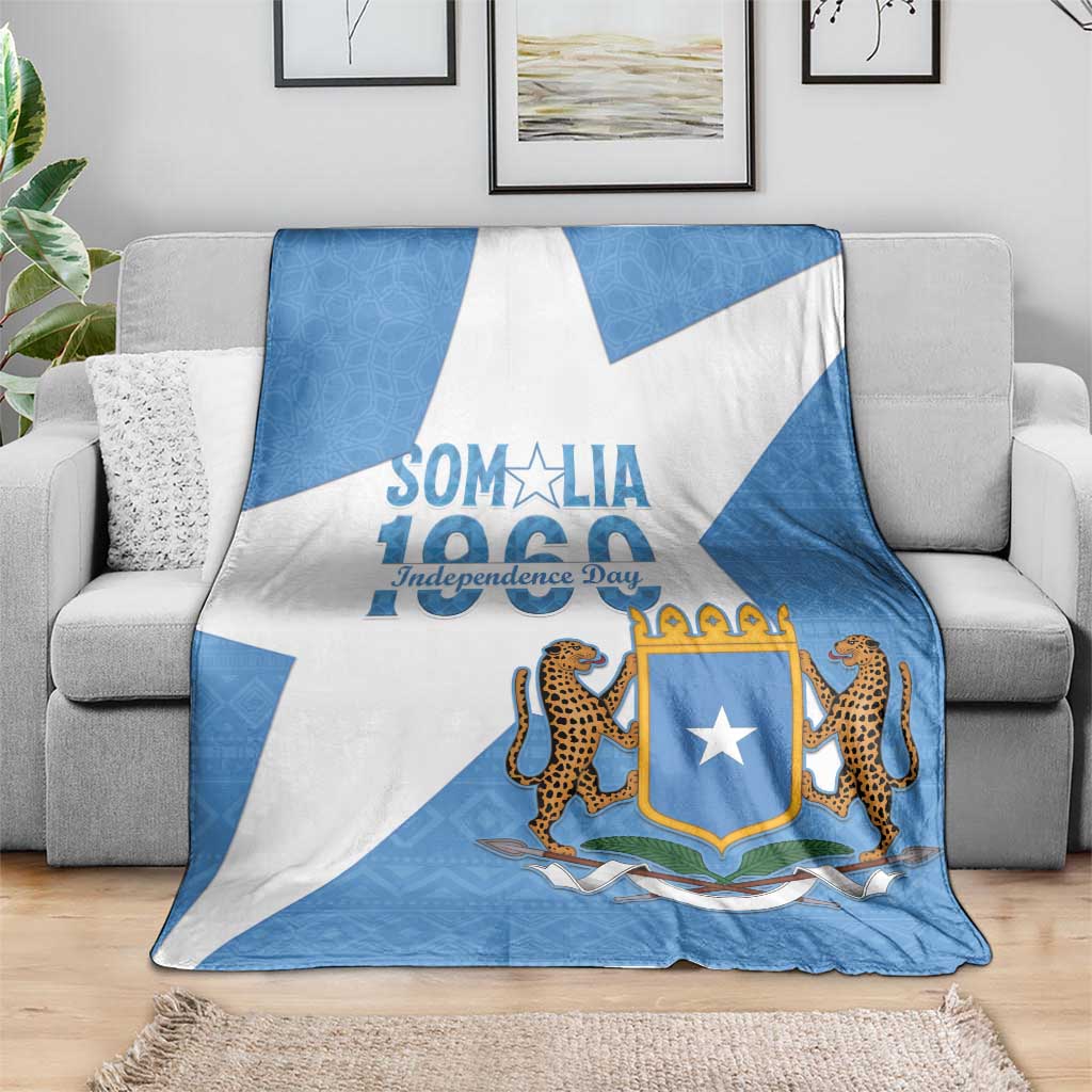 Somalia Independence Day blanket coat, blue and white diagonal pattern on sofa