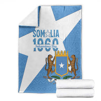 Somalia Independence Day blanket coat, folded blue-and-white design with coat of arms