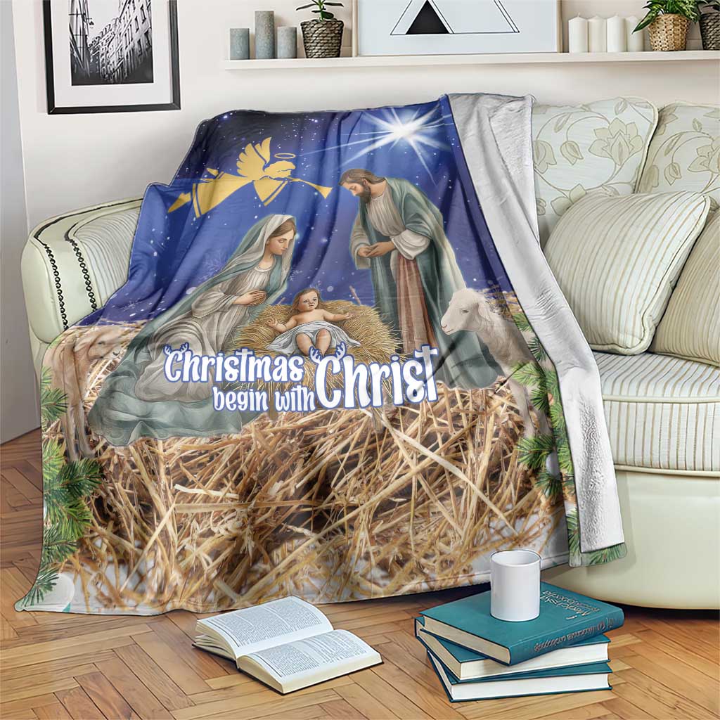 Blue Christmas blanket with nativity scene and text “Christmas begin with Christ”