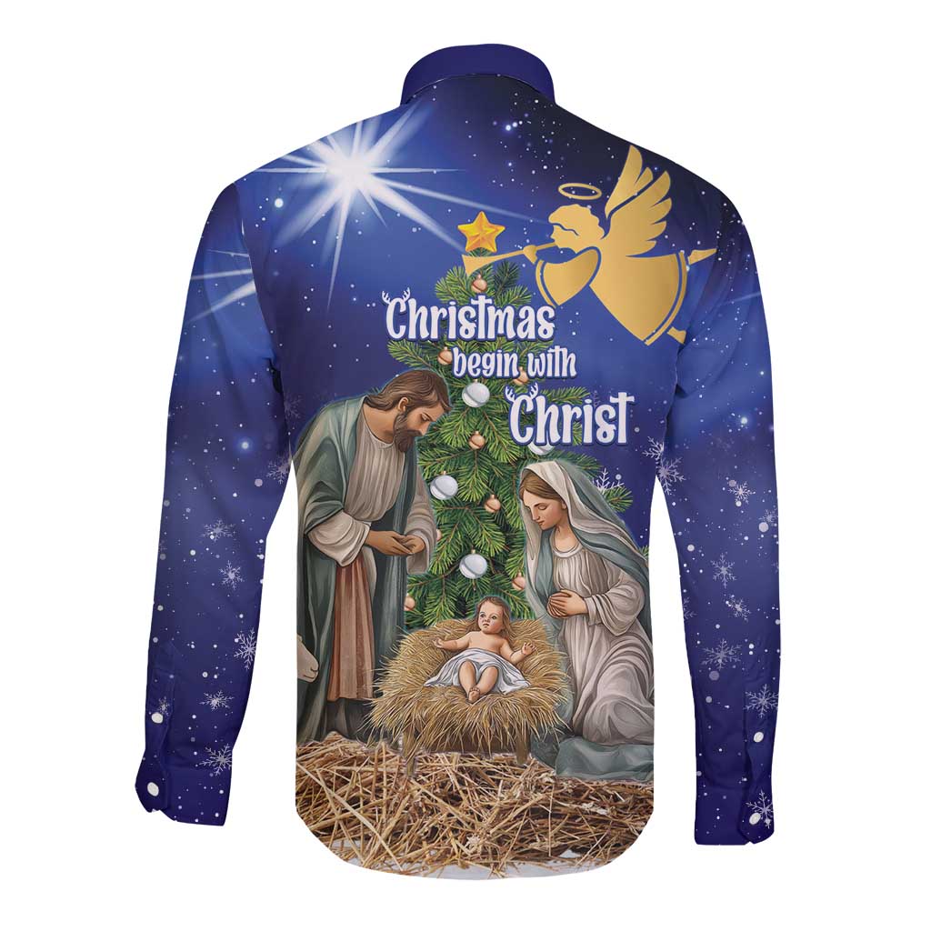 Blue long-sleeve button-up shirt with nativity back graphic, star, and Christmas Begin text