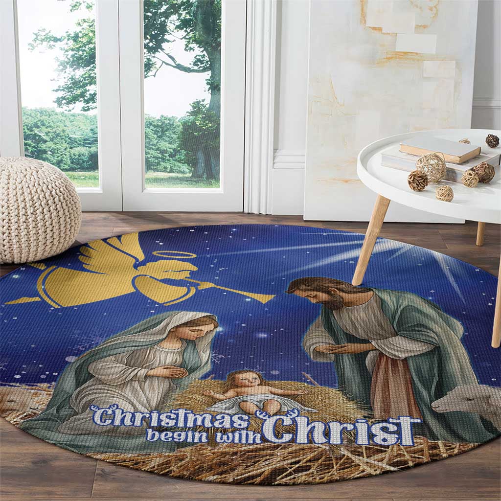 Blue round Christmas nativity rug with shepherds, manger, and “Christmas begin with Christ”
