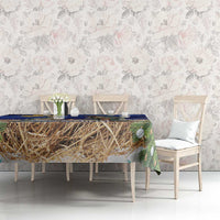 Blue Christmas tablecloth with straw hay stripe and green pine branches on dining set
