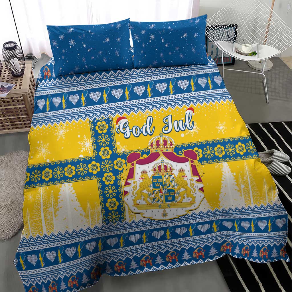 Blue-and-yellow Scandinavian Christmas bedding with two pillows and central crest, God Jul