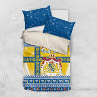 Scandinavian Christmas bedding set with blue star pillows and yellow-blue duvet, God Jul