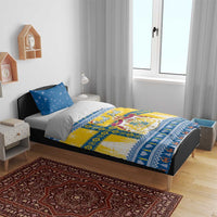 Bedding set on a bed frame: blue star pillows with yellow-and-blue Scandinavian Christmas duvet