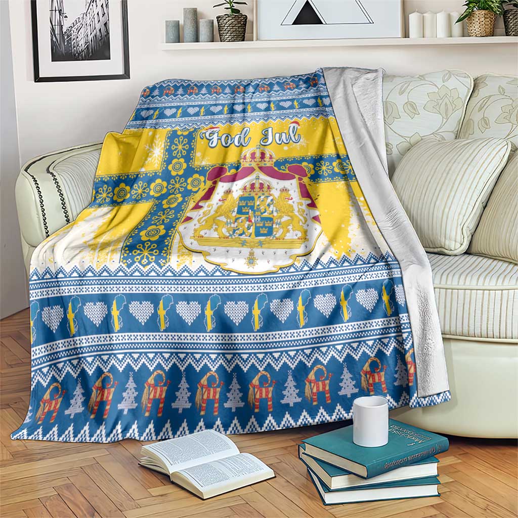 Scandinavian Christmas blanket with blue, yellow, and white pattern and “God Jul” text