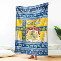 Scandinavian Christmas blanket with bold blue border, yellow center, and “God Jul”