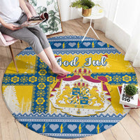 Round Christmas rug edge view with blue and yellow pattern and God Jul text