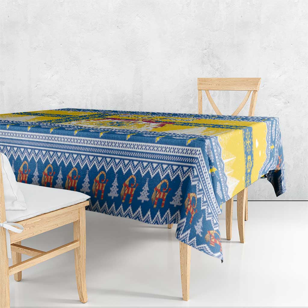 Blue and yellow Scandinavian Christmas tablecloth with repeating figure border