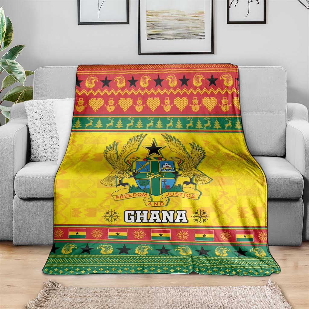 Yellow Ghana Christmas blanket draped over couch, coat of arms crest and 'Ghana' logo