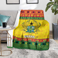 Yellow Ghana Christmas blanket featuring coat of arms, star pattern, and festive green-red trim