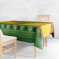 Ghana Christmas tablecloth corner view in green and yellow with decorative geometric border print