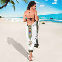 White Habesha sarong worn as cross, with central tillet panel and striped hem