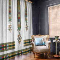 White curtain panel with multicolor vertical border bands and cross medallion
