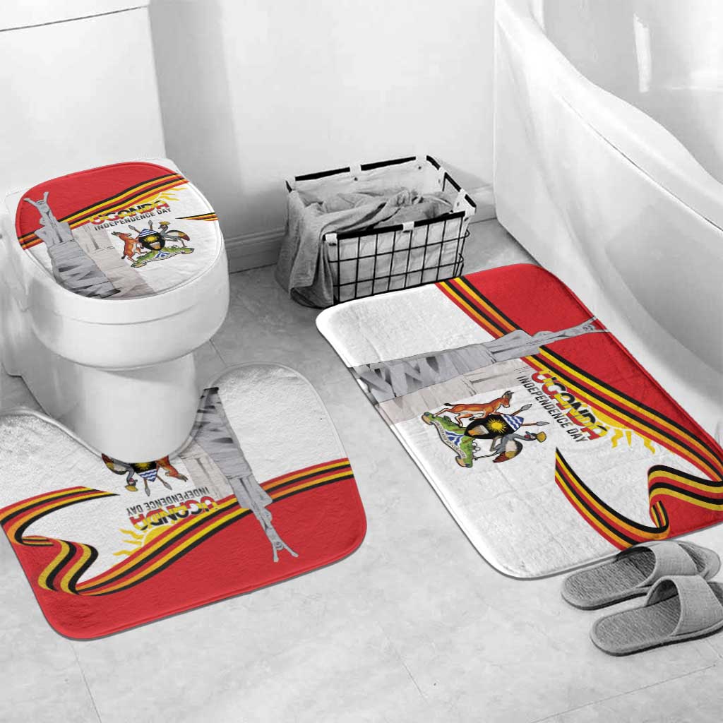Bathroom set with toilet lid cover and bath rug featuring Uganda Independence Day print