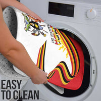 Easy-to-clean Uganda Independence Day shower mat shown on a washing machine