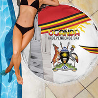 Round beach blanket with Uganda Independence Day graphic and tassel fringe, partial view