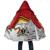 Hooded red-and-white cloak coat with multicolor emblem graphic and gray paneling
