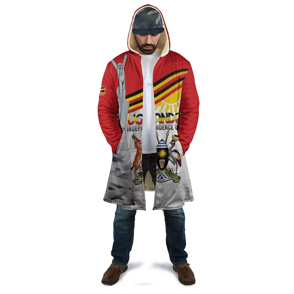 Hooded cloak coat with red hood, white front, and multicolor emblem print