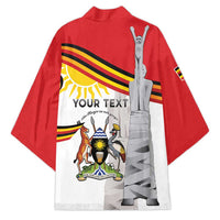 Red kimono coat with back-style monument print, stripe accents, and graphic panel