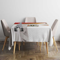 Uganda Independence Day tablecloth top view, white with central crest and red/yellow/black stripes