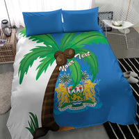 Sierra Leone bedding set close-up: blue duvet with palm trees and coat-of-arms shield, two pillows