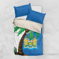 Sierra Leone bedding set with blue pillowcases and white-blue duvet featuring palm trees and crest