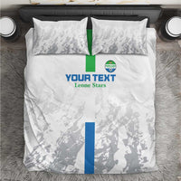 White football-themed bedding set with two pillowcases, grey pattern and blue/green flag stripe