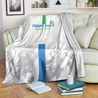 White and gray football blanket with green and blue stripe and Leone Stars logo