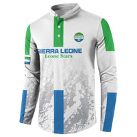 White football button sweatshirt with green placket, blue sleeve bands, team crest