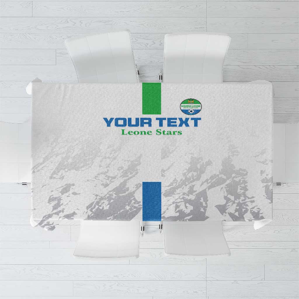 White football tablecloth with green emblem and “Leone Stars” text, folded with clips