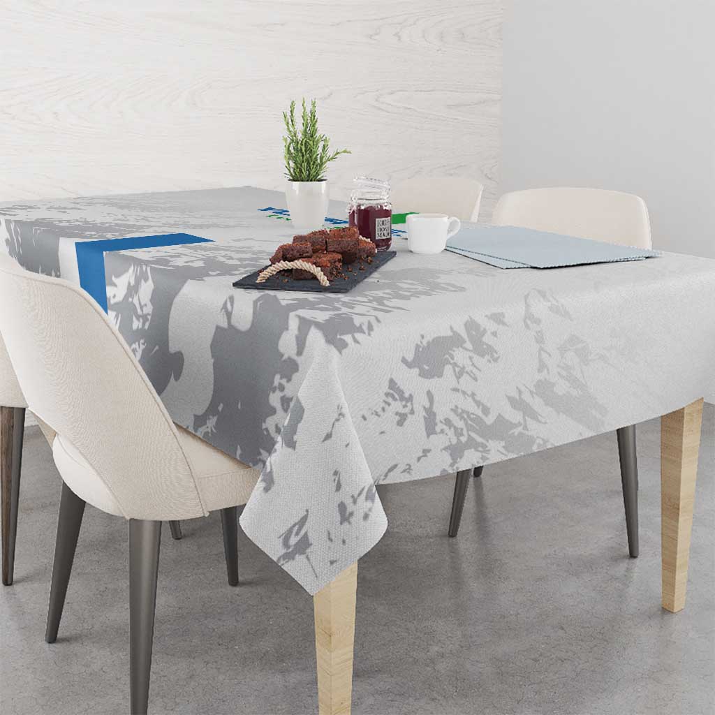 Gray football tablecloth with blue edge stripe and player silhouette print, draped