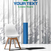 White football window curtain showing custom blue “YOUR TEXT” and green “Leone Stars”