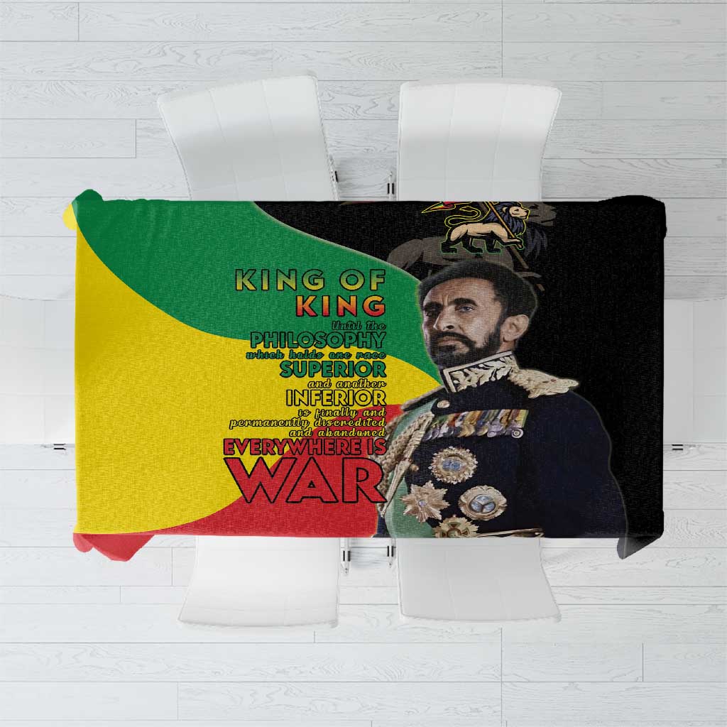 Black tablecloth featuring a Lion of Judah portrait and bold multicolor text design