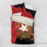 Red and black bedding set with crocodile graphic, duvet cover, and two pillowcases