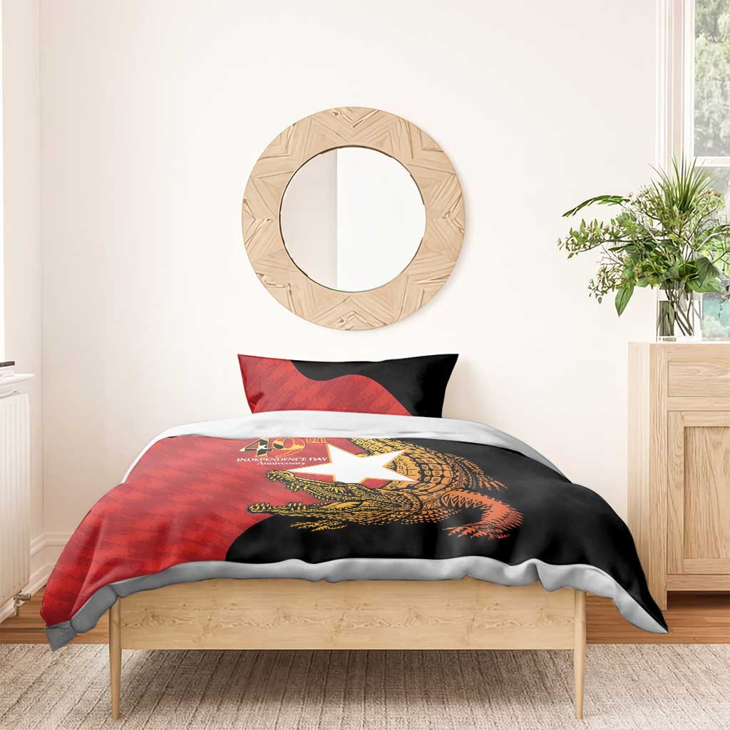 Red and black bedding set with crocodile graphic and two pillow shams on wooden bed
