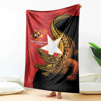East Timor Independence Day blanket draped in red and black with gold crocodile graphic