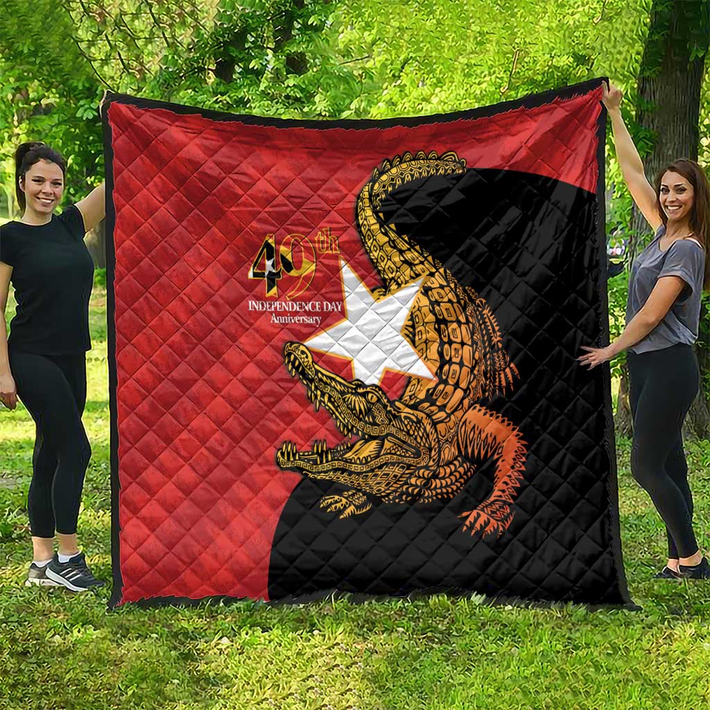 Red and black quilt with quilted design and large golden crocodile graphic, 40th anniversary logo