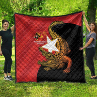 Red and black quilt with quilted design and large golden crocodile graphic, 40th anniversary logo