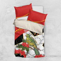 Personalized bedding set with red pillows, red-and-black duvet featuring hibiscus and bird