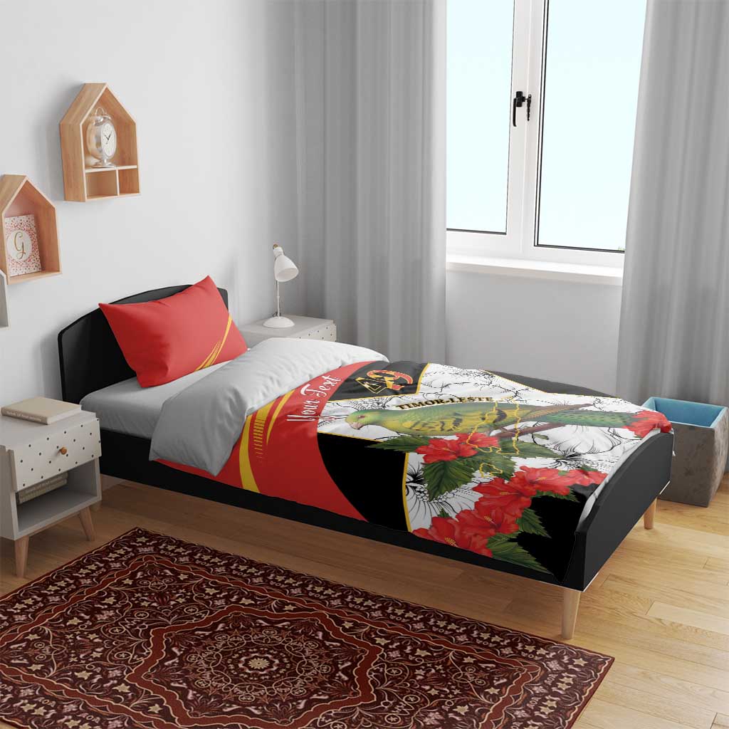 Personalized bedding set on bed: red and black duvet with hibiscus flowers and green bird