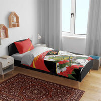Personalized bedding set on bed: red and black duvet with hibiscus flowers and green bird