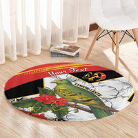 Round black, red, and white carpet with green bird and hibiscus flowers, “Your Text”