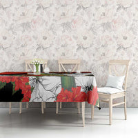 Red, black, and white tablecloth featuring bird and hibiscus floral pattern