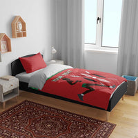 Red duvet cover with green stripe and runner graphic, 'YOUR TEXT', two matching red pillows