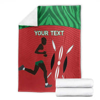 Red and green athletics blanket folded stack, featuring 'YOUR TEXT' and runner silhouettes