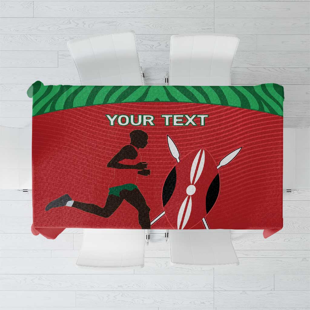 Red tablecloth with green border and sports-themed runner and animal silhouette print